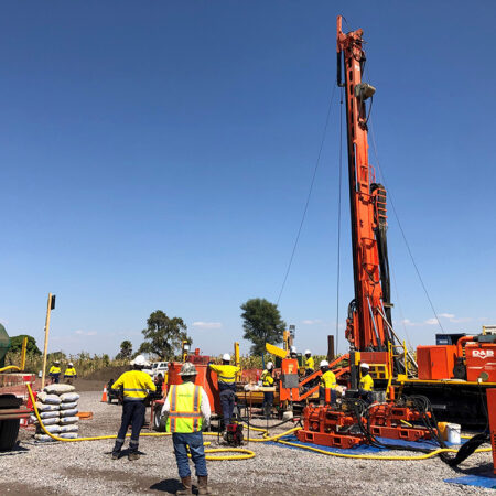 Mitchell Drilling Hanjin D&B -45D rig in daylight on Tai-1/-1A location