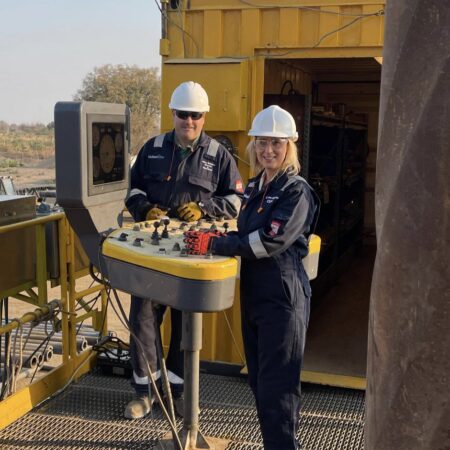 25.09.23 – Our CEO Lorna Blaisse, and Director of Operations Mike Williams, on the drill floor of the Epiroc Predator 220 for the spud of the Tai-3 well.