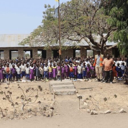 03.10.23 – Continued community engagement work in the region we operate is critical to building strong relationships with the local community…

HE1 CEO (L) and HE1 CLO (R) meet with 400 children at Mkonko village Primary School.